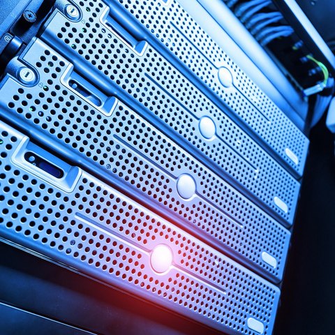Rack-mounted servers representing IT infrastructure and supply services