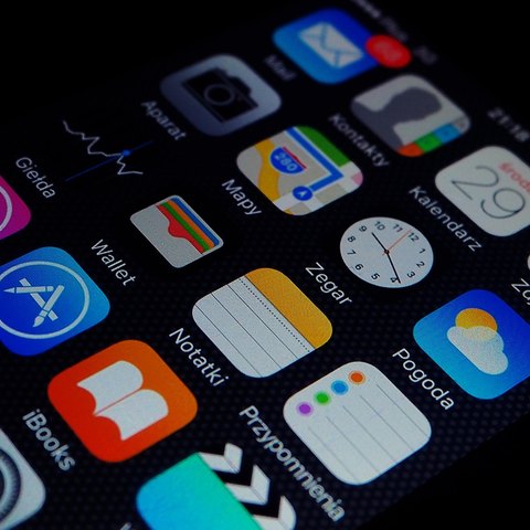 Smartphone app icons representing mobile application development at SIIS